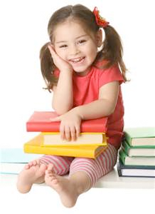 Smiling girl with books